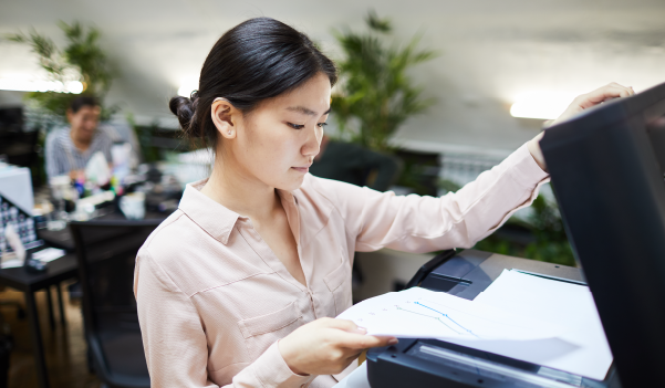 Woman operating printer